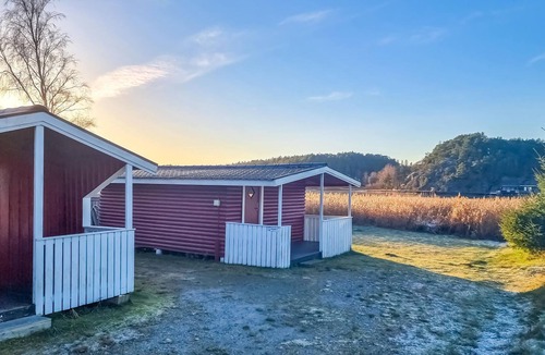 Stromstad O House | Nice small wooden cottage on natural plot by the sea fjord.