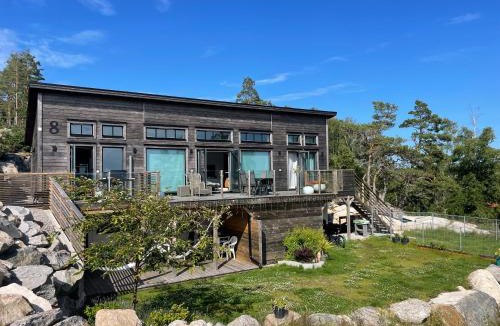 Lokholmen Apartment | Ny lägenhet på markplan med havsutsikt