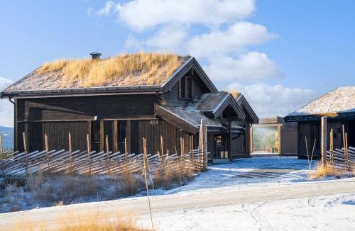 Vikberget House | Ny og moderne hytte med sauna, jacuzzi og eget spillrom med biljard og dart Gratis elbillading og strøm inkludert i prisen