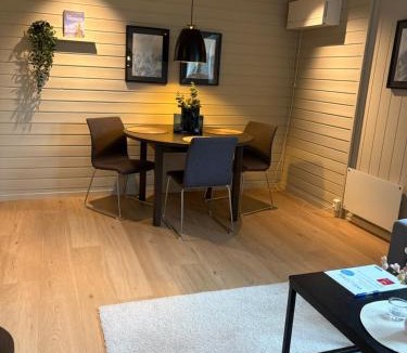 Kvaløysletta Apartment | Nyoppusset sokkelleilighet med bra bussforbindelser