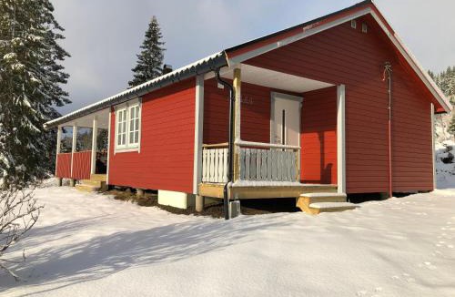 Lierne House | Nyrestaurert og koselig hytte ved Skjelbredvatnet.