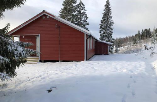 Lierne House | Nyrestaurert og koselig hytte ved Skjelbredvatnet.