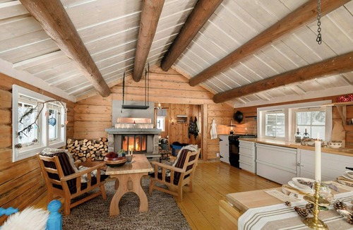 Lillehammer House | Off-grid timber cabin by river near Lillehammer