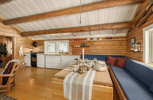 Lillehammer House | Off-grid timber cabin by river near Lillehammer
