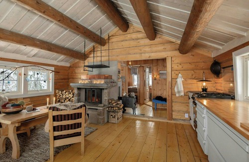 Lillehammer House | Off-grid timber cabin by river near Lillehammer