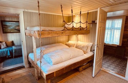Eidsvoll House | Old Farmhouse Retreat with jacuzzi and sauna