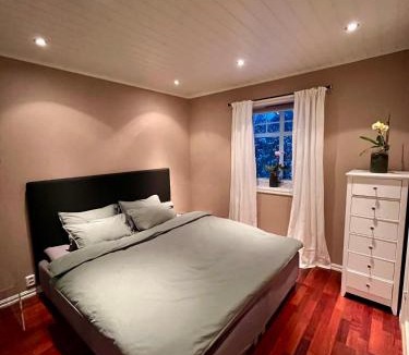 Nesoddtangen House | Panoramic Oslofjord Views with Private Beach Hut