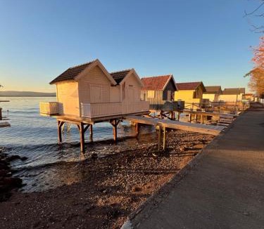 Nesoddtangen House | Panoramic Oslofjord Views with Private Beach Hut