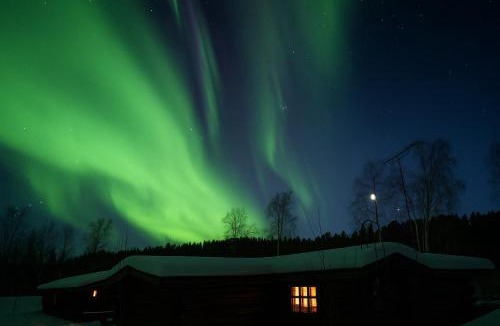 Inari Villa | Private log villa by the Ivalo River