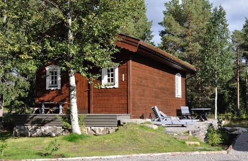 Sorsele House | Quaint holiday home in the forests of Lapland by the river