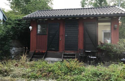 Innerstaden House | Röda stugan intill Ringmuren