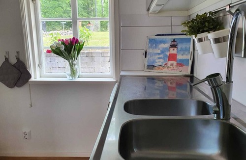 Asljunga Cottage | Red cottage at Åsljungasjön Skåne Sweden, family and dog friendly.
