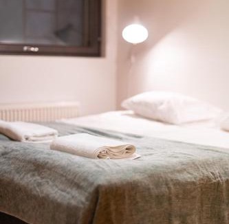 Pyhatunturi House | Roggenecke - Pyhä HolySuites - Cosy Ski-In & Ski-Out Apartment with Scenic Views in the Heart of the Ski Resort