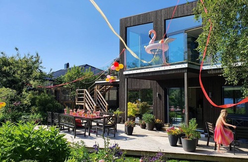 Sandnes Villa | Scenic Lakeside Residence with Spacious Outdoor Living