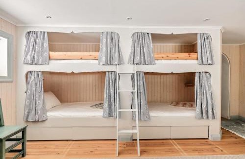 Stavsnas Villa | Seaside Bliss for Families: Home Away from Home