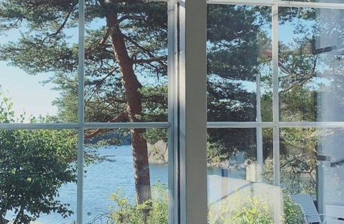 Sogne House | Seaside cabin at Vige with jetty and large terrace