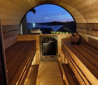 Steinsland House | Seaside cottage with hot tub and sauna sleeps 11