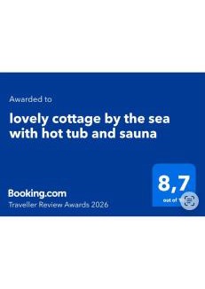 Steinsland House | Seaside cottage with hot tub and sauna sleeps 11