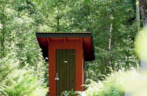 Lilla Edet House | Small cabin with outdoor kitchen by forest stream