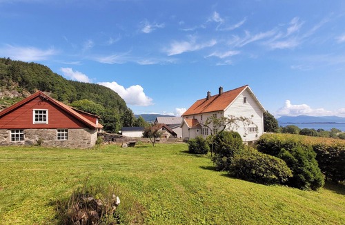 Nedstrand House | Spend relaxing summer days in this spacious vacation home on the peninsula, Nedstrand.