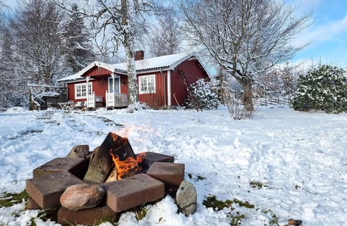 Mullsjo House | Step into a decorative cottage with a rustic flair.