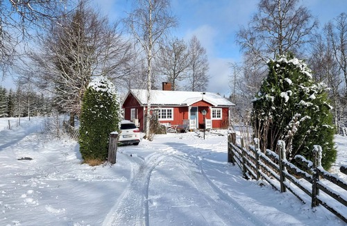 Mullsjo House | Step into a decorative cottage with a rustic flair.