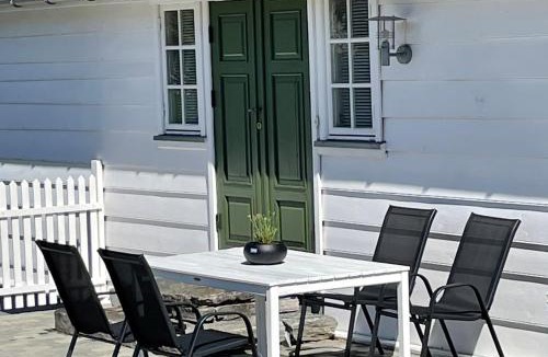 Møre og Romsdal House | Stort hus med tømmervegger og fjordutsikt