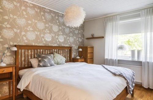 Sibbhult Villa | Stylish Family Retreat with Jacuzzi and Cinema