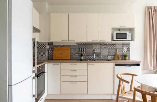 Renko Apartment | Stylish two-storey home, parking and sauna