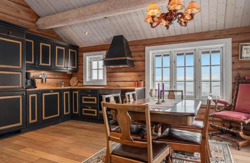 Nord-Aurdal House | Tømmerhytte i Valdres med panoramautsikt over fjellene