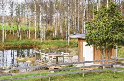 Mariannelund House | The cottage has an open floor plan and is located in the countryside.