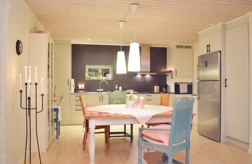 Angelholm House | The cottage is located on a hill where there used to be a windmill.