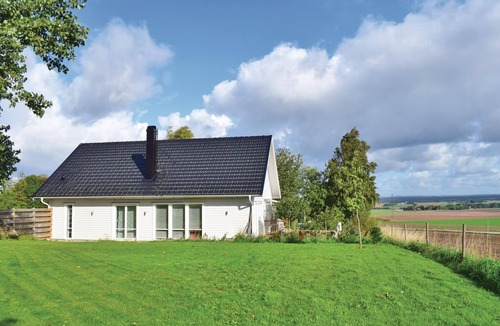 Angelholm House | The cottage is located on a hill where there used to be a windmill.