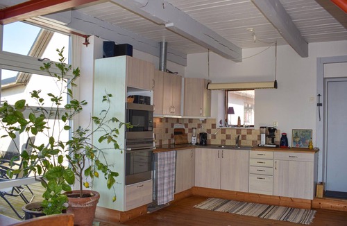 Glemminge House | The renovated cottage on a round yard with beautiful views of the open countryside just outside the