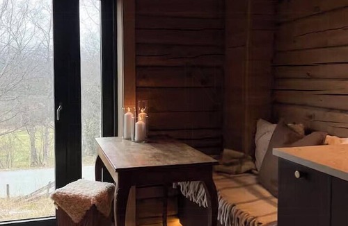 Oppdal House | Timber cabin by the ski slopes in Oppdal