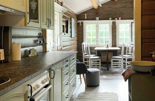 Lierne House | Timber cabin by trout river in Lierne