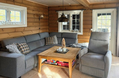 Bjorli House | Timber cabin with hot tub by ski tracks