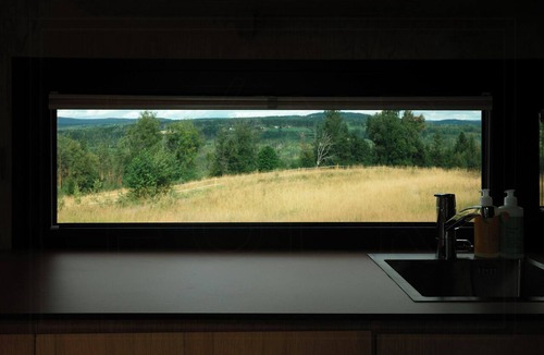 Elverum House | Tiny house between field and forest at Storberget