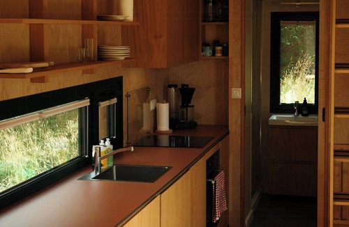 Elverum House | Tiny house between field and forest at Storberget