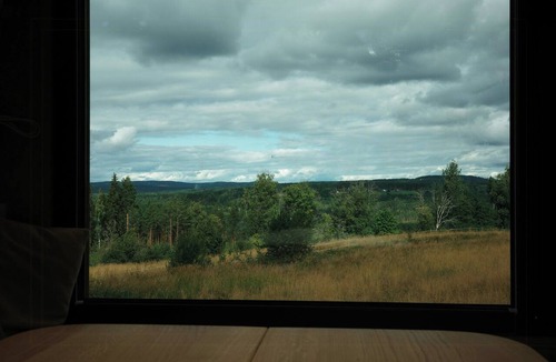 Elverum House | Tiny house between field and forest at Storberget