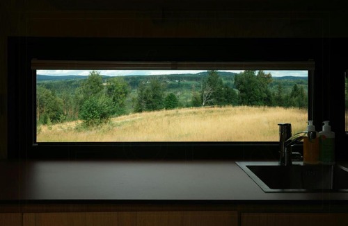 Elverum House | Tiny house between field and forest at Storberget