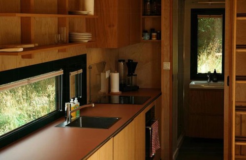 Elverum House | Tiny house between field and forest at Storberget
