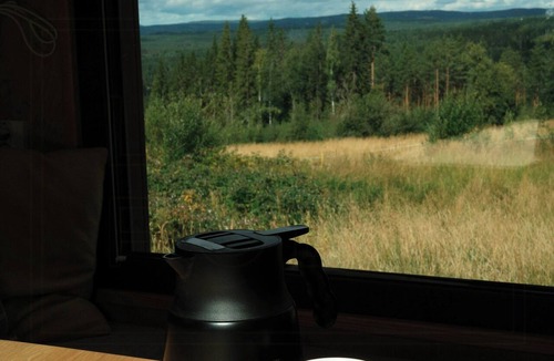 Elverum House | Tiny house between field and forest at Storberget