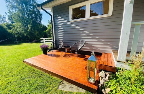 Laholm House | TOP holiday home at Laholm/Mellbystrand with sun terrace, fireplace + conservatory