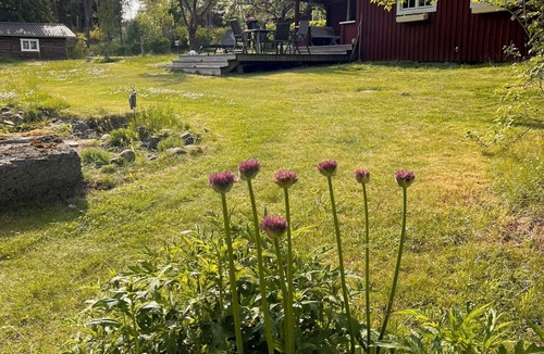 Adelfors House | Top renovated red vacation home in Ädelfors by the river Emån, in Småland.