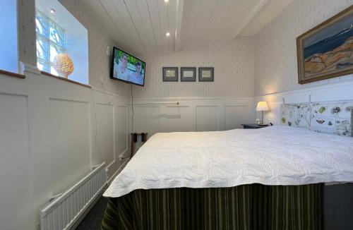 Halmstad Bed & Breakfast | Trädgårdscafé Pedalen B&B