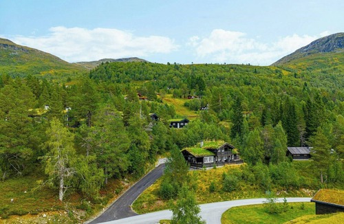 Stryn House | Traditional cabin with turf roof near Stryn