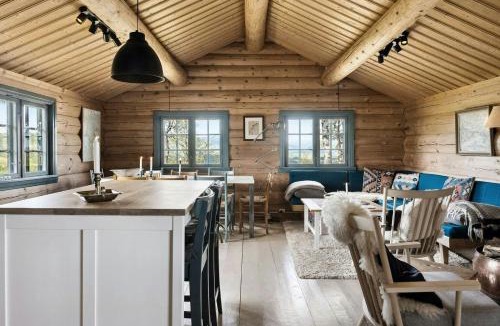 Rauland House | Traditional Log Cabin At Vierli