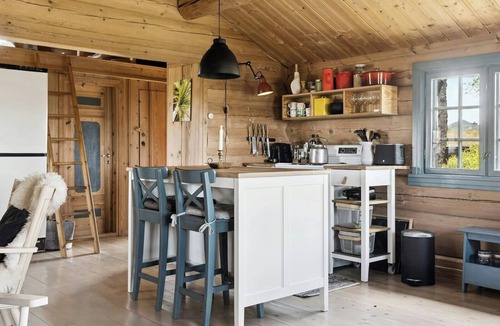 Rauland House | Traditional log cabin at Vierli