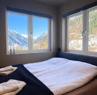 Odda Apartment | Trolltunga Stay - Mountain & Waterfall View